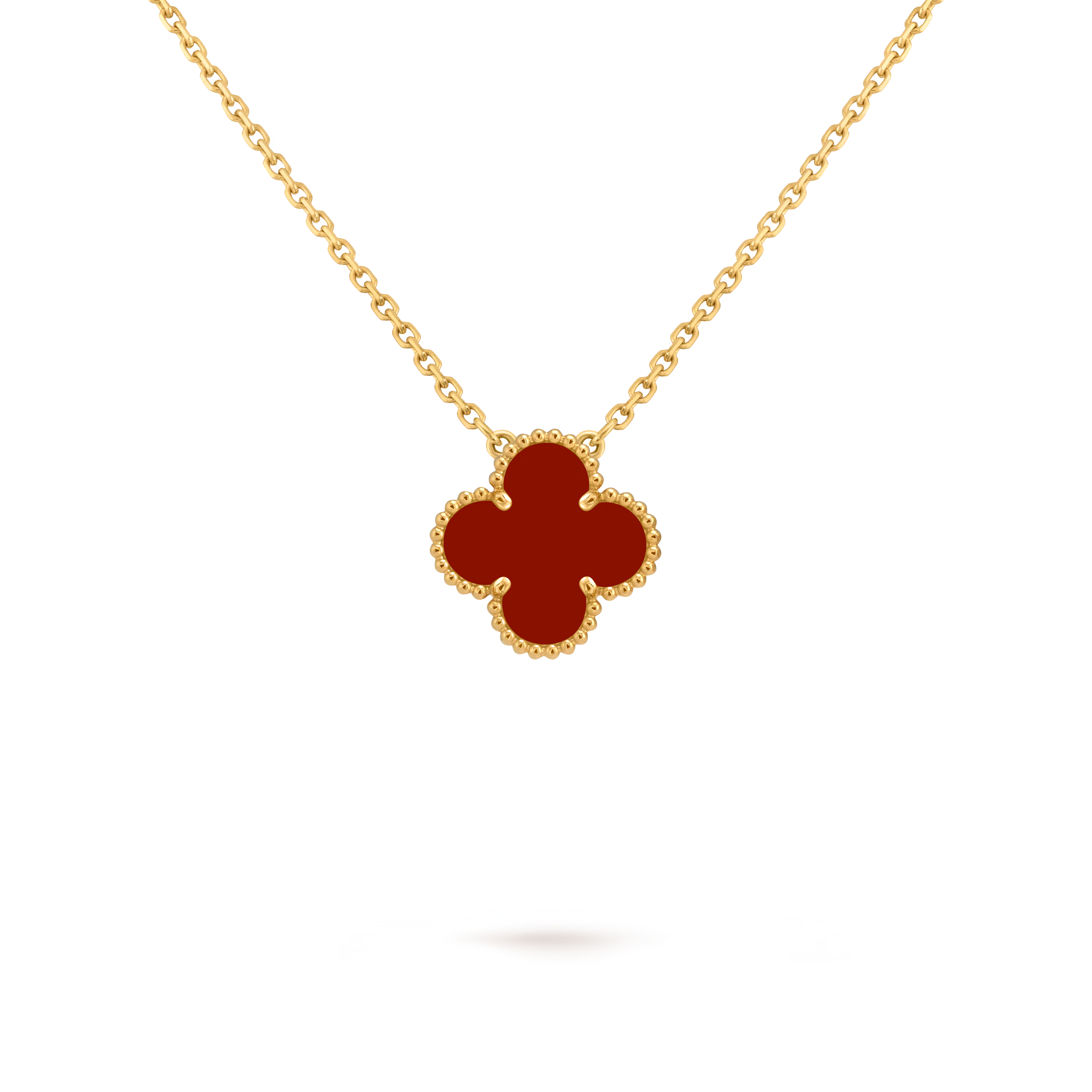 Van Cleef & Arpels. Підвіска Vintage Alhambra із жовтого золота з корнеолом
