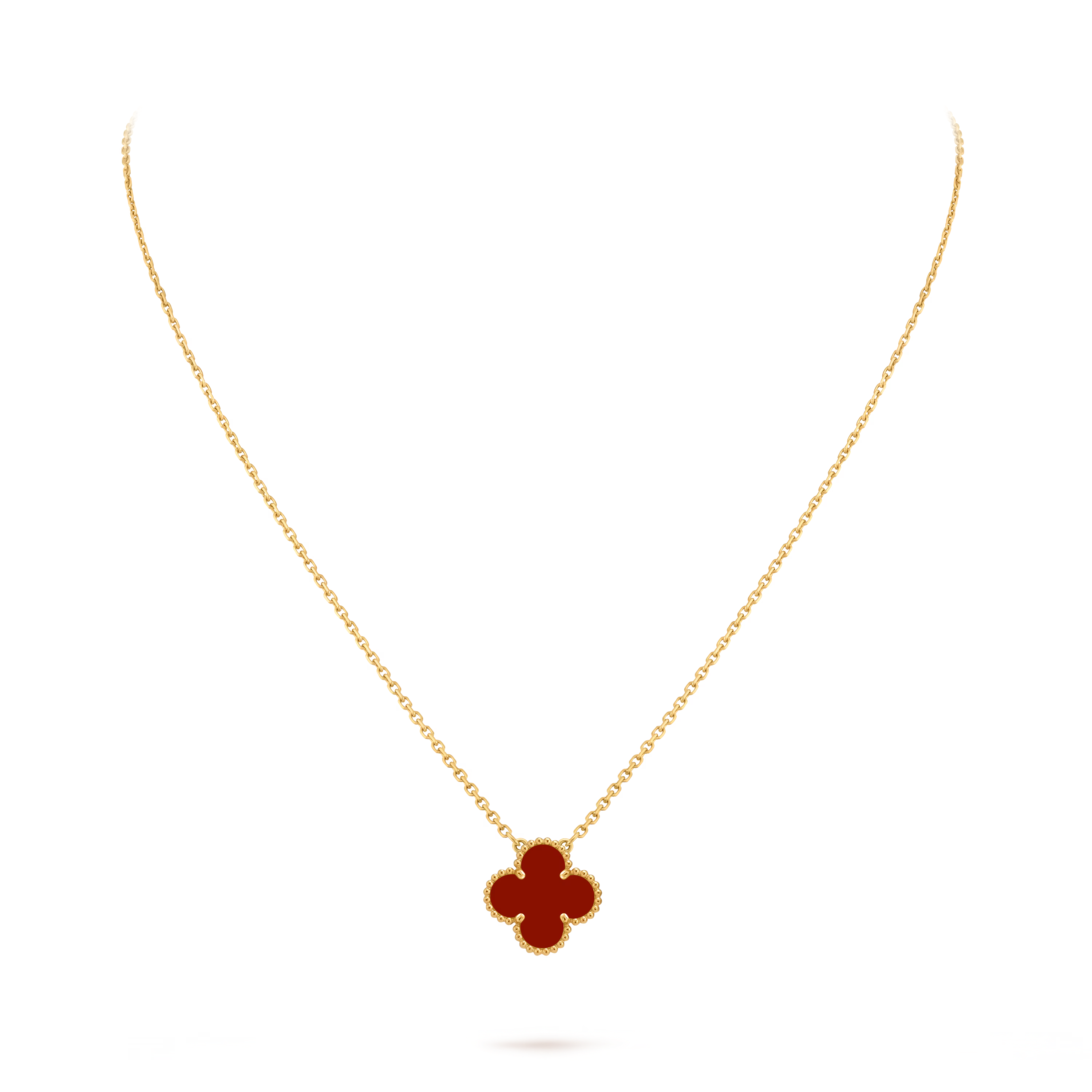 Van Cleef & Arpels. Підвіска Vintage Alhambra із жовтого золота з корнеолом