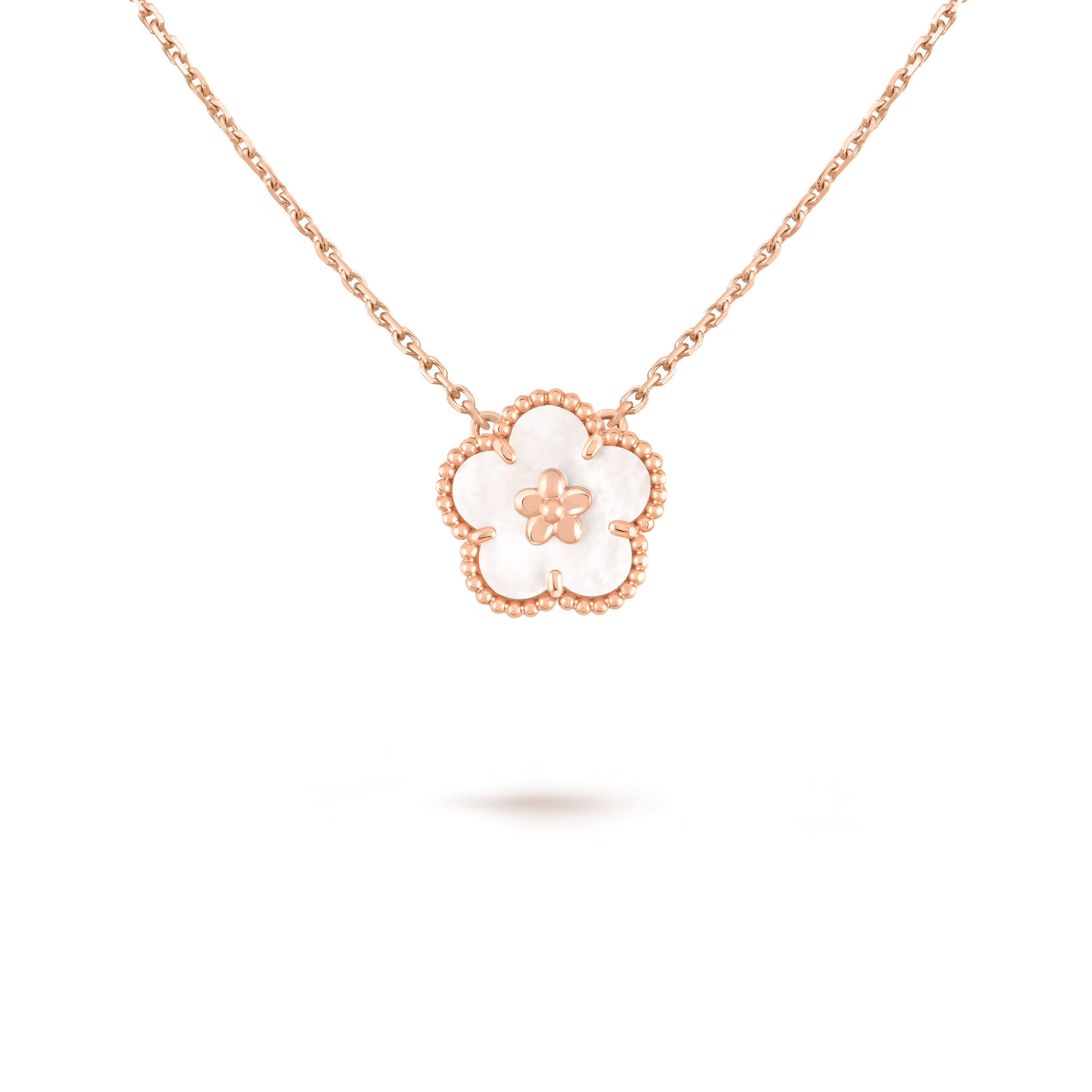 Van Cleef & Arpels. Підвіска Lucky Spring, квітка сливи із рожевого золота з білим перламутром