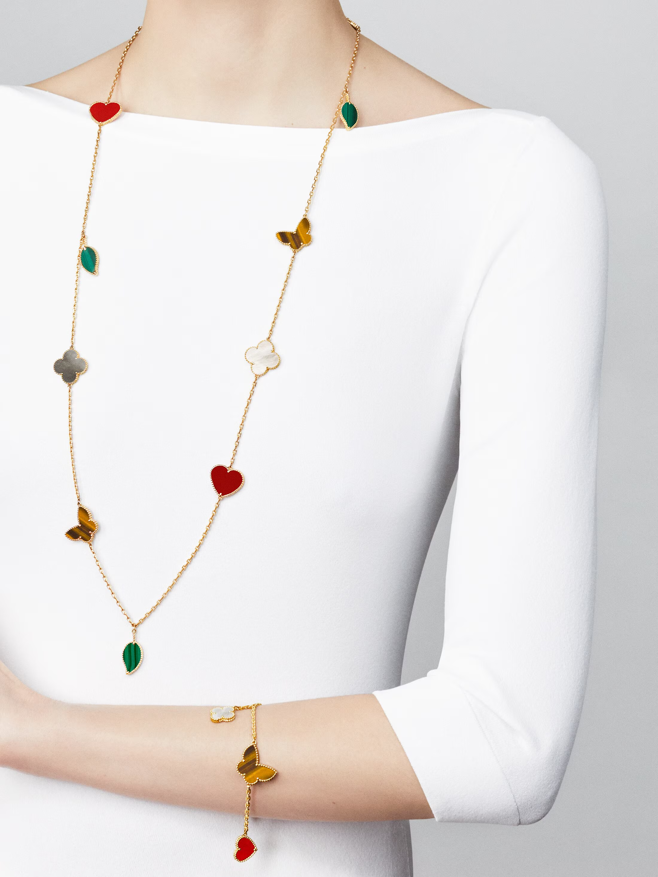 Van Cleef & Arpels. Браслет Lucky Alhambra із жовтого золота в поєднанні з камінням
