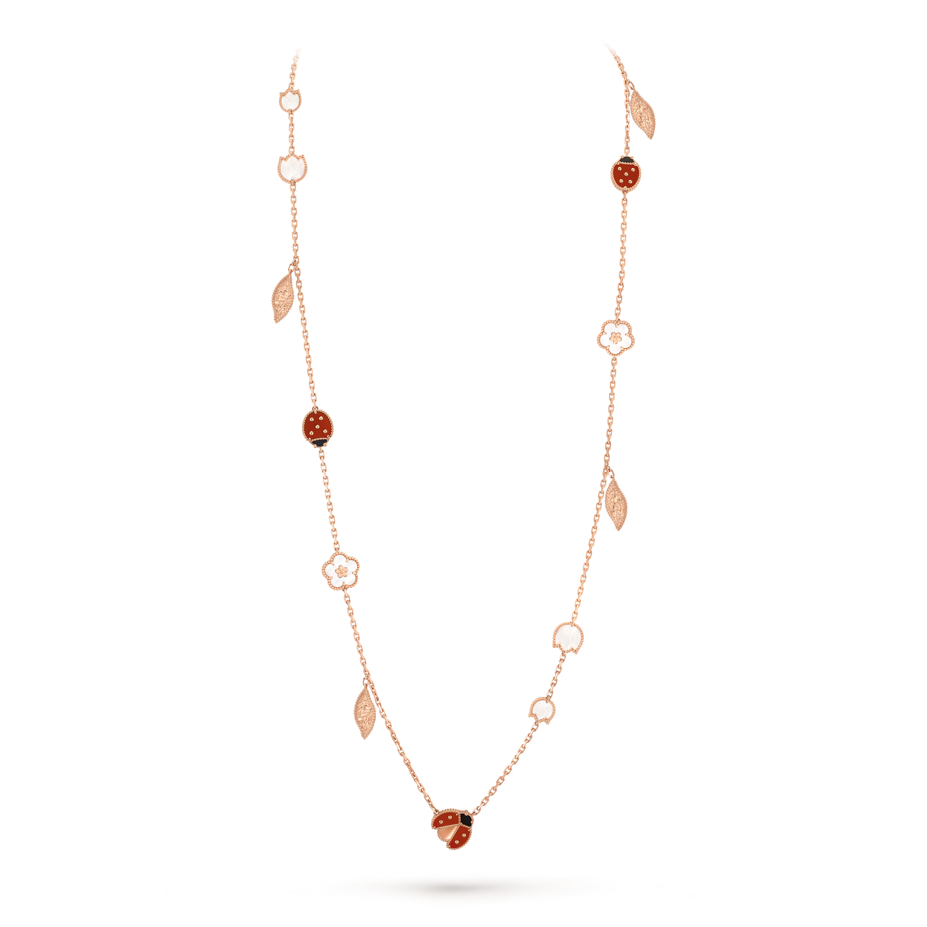Van Cleef & Arpels. Довге кольє Lucky Spring із рожевого золота з білим перламутром, сердоліком та оніксом