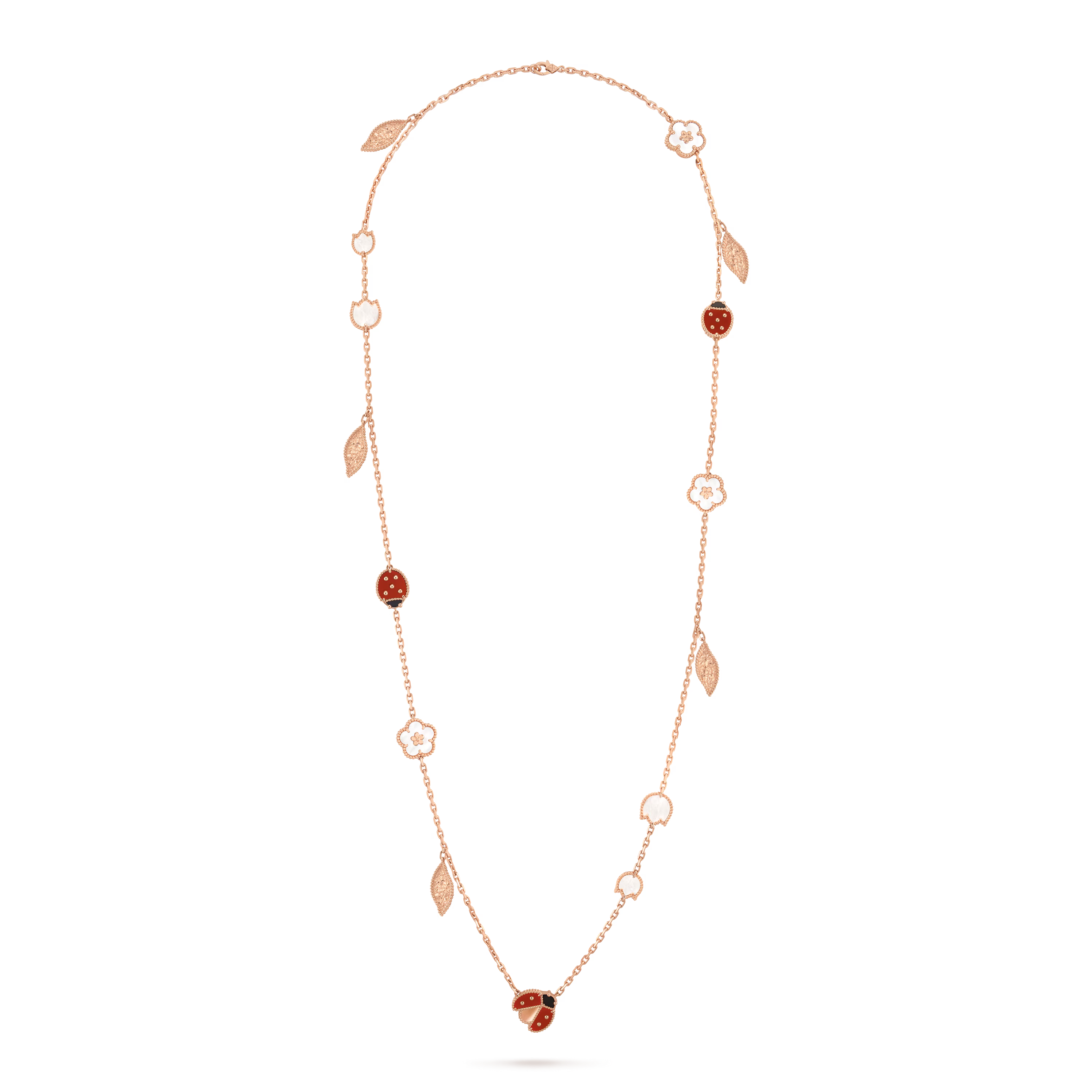 Van Cleef & Arpels. Довге кольє Lucky Spring із рожевого золота з білим перламутром, сердоліком та оніксом