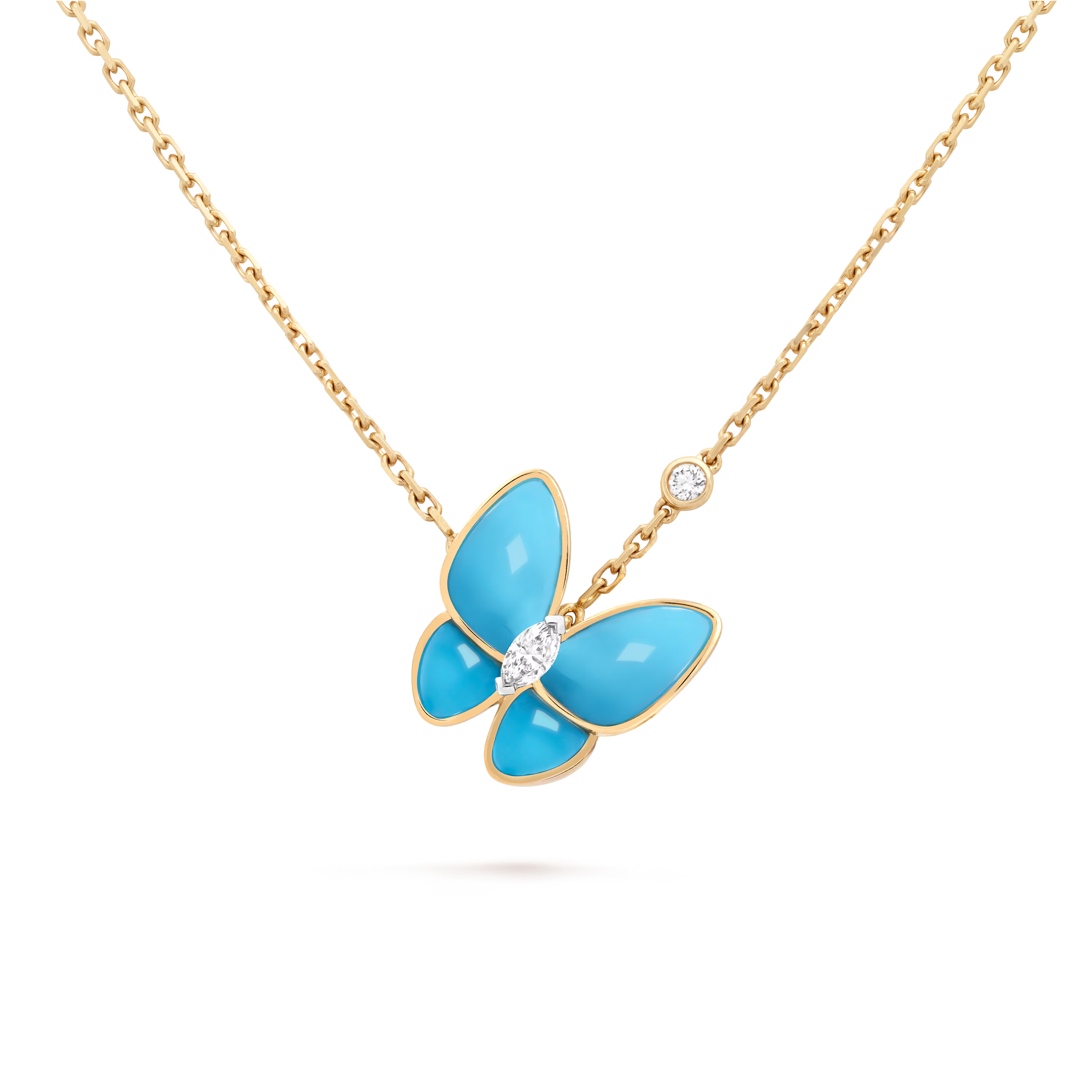 Van Cleef & Arpels. Підвіска Two Butterfly із жовтого золота з бірюзою