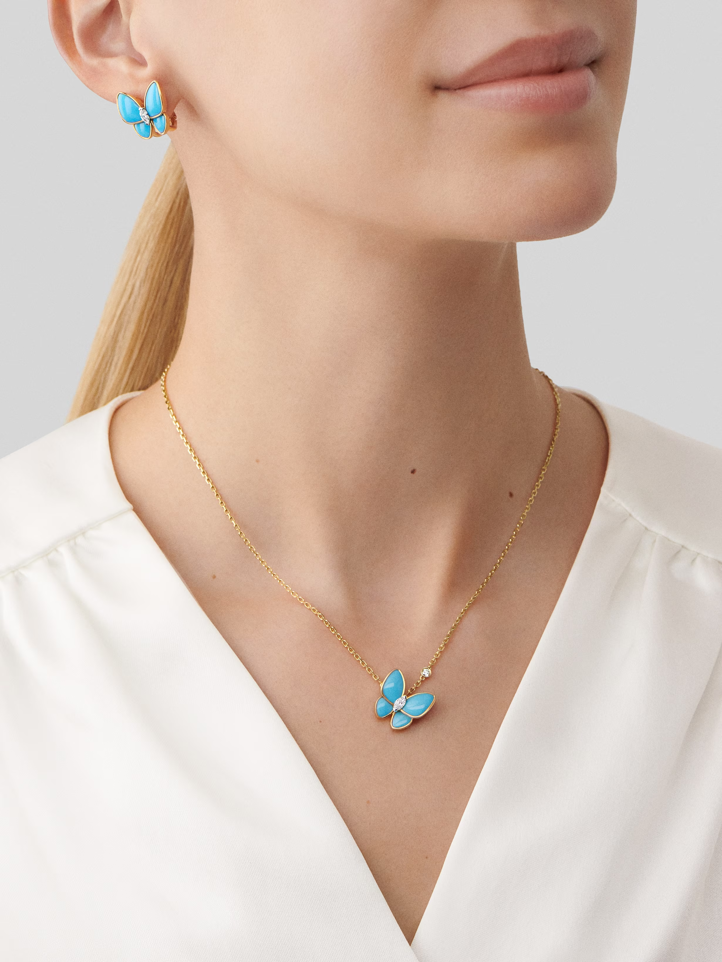 Van Cleef & Arpels. Підвіска Two Butterfly із жовтого золота з бірюзою