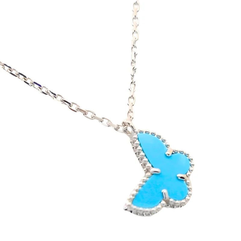 Van Cleef & Arpels. Підвіска Alhambra Butterfly із білого золота з бірюзою